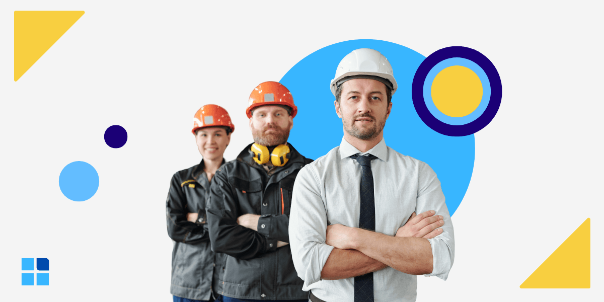 Three construction workers wearing hard hats stand confidently.