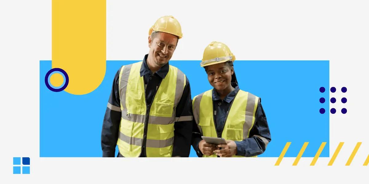 Two construction workers wearing yellow hard hats and reflective vest.