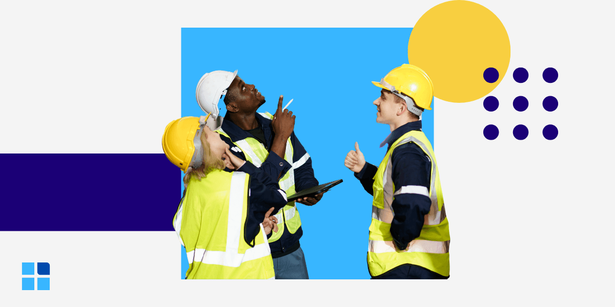 Three construction workers in yellow safety vests and helmets conversing.