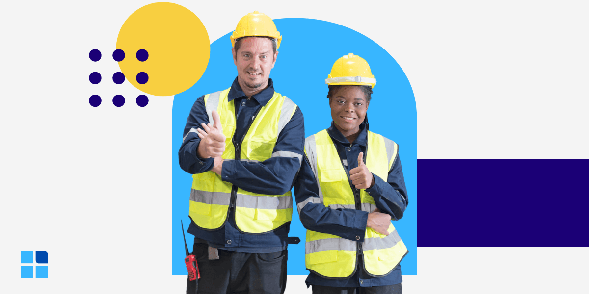 Two construction workers wearing yellow hard hats and reflective vests give thumbs up.