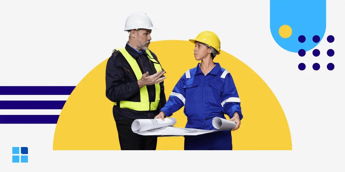 Two construction workers, one in a white helmet and another in a yellow helmet, discuss blueprints.